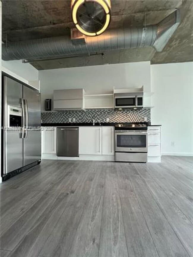 Building Photo - 690 SW 1st Ct