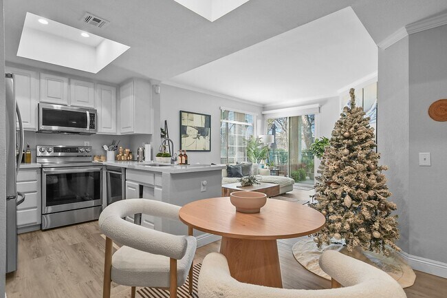 Building Photo - Remodeled River-View Corner Unit with Oversized Patio