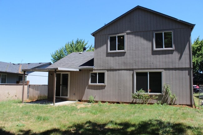 Building Photo - Four bedroom, two bath family home on quie...
