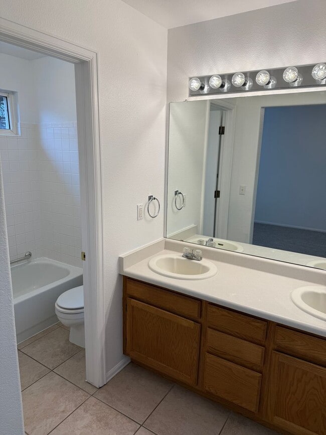 Building Photo - Spacious 4-Bedroom Ranch with Finished Bas...