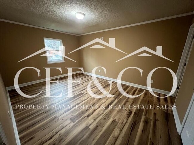 Building Photo - Beautiful 4 bedroom brick ranch now available!