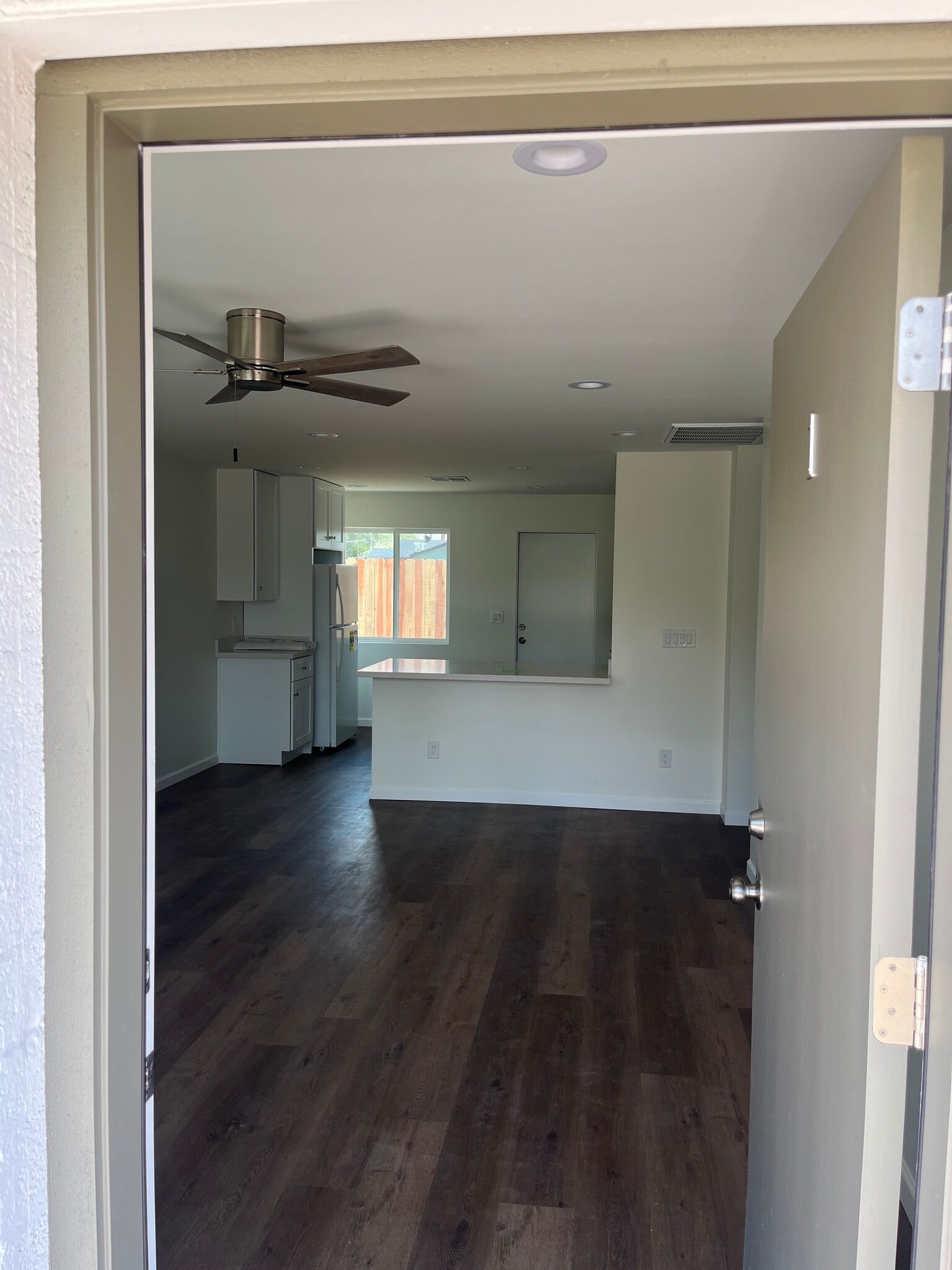 Front door to kitchen/living room Unit #1 - 1727 E Oak St