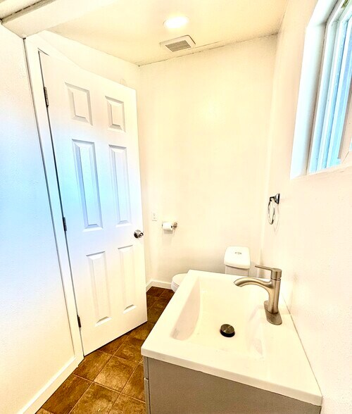 Second half bath off of back porch - 601 J Street