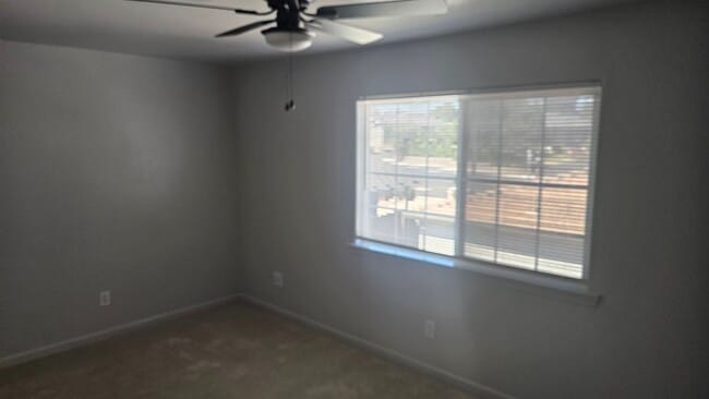 Building Photo - Three Bedroom Two and a half bath house, 2 car garage, central air. Available now.
