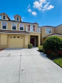 Building Photo - 3 Bedroom, 2.5 Bathroom 2-Story Townhouse in Gated Community - Kissimmee