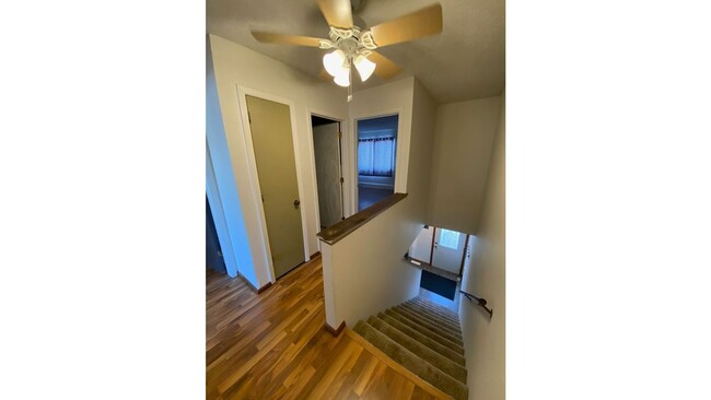 Building Photo - Spacious 3 - Bedroom Townhome with Modern Updates & Private Green Space.