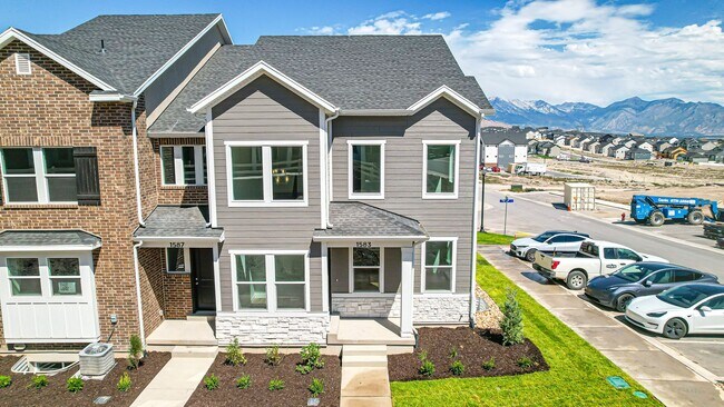 Building Photo - NEW *No Security Deposit Required Upfront!    2024 Townhome With Move In Special!