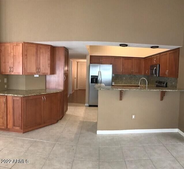 Building Photo - 11021 E Poinsettia Dr