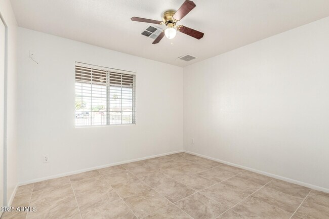 Building Photo - 8107 W College Dr