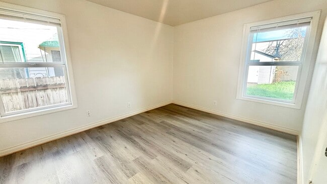 Building Photo - Recently Renovated House With Fenced Back Yard, Attached Garage, and Basement