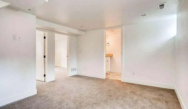 Building Photo - Three bedroom, 2 bathroom modern property!...