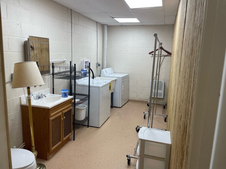 Bathroom and Laundry Area. A Shower has since been added to this bath. - 172 Cross Park Dr