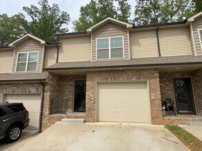 Building Photo - Gated Sango Townhome- Prime Location for Commutes