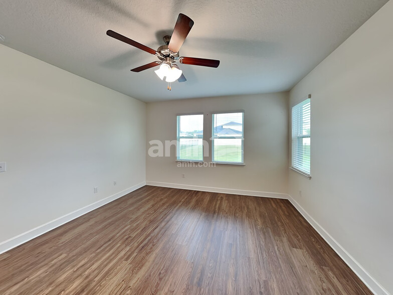 Building Photo - 6614 Hidden Rose Pl