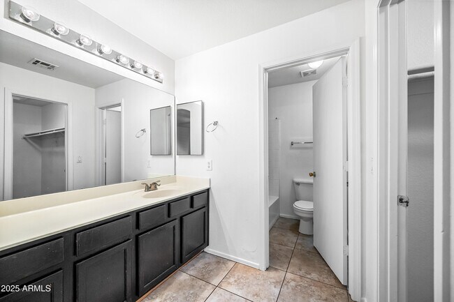 Building Photo - 9018 W Cambridge Ave