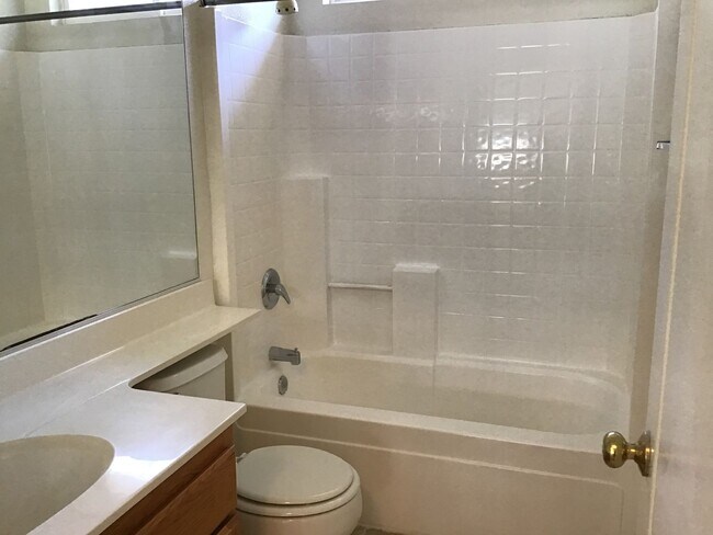 Building Photo - Three bedroom in gated community.