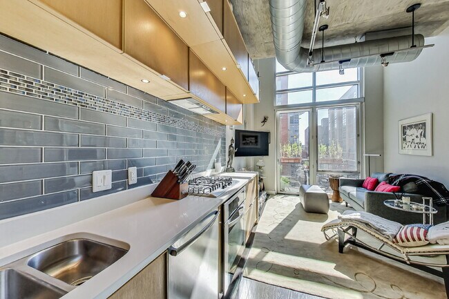 Building Photo - Two-Level Loft Condo at The Metropole