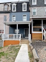 New front sidewalk leads inside. - 1320 W Sycamore St