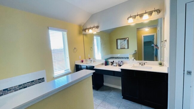 Double vanity sinks and desk - 7108 Garnet Mill Ln