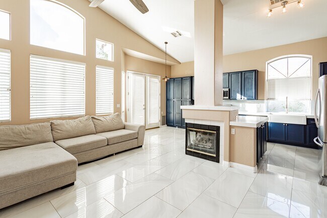 Fireplace and access to backyard. - 8600 Mirada del Sol Dr