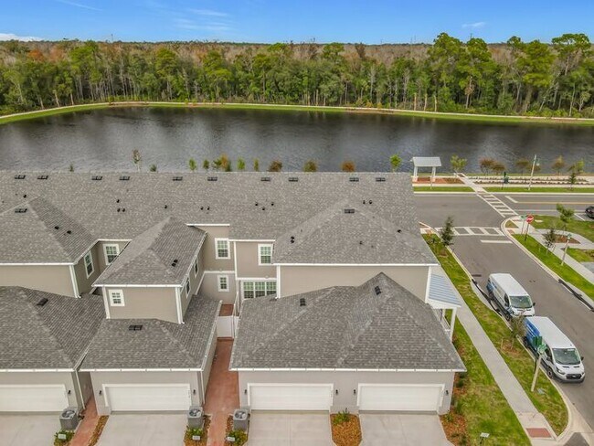 Building Photo - New Luxury Townhome in Celebration, FL Corner unit. All porcelain tiled floors. Aleutian model by...