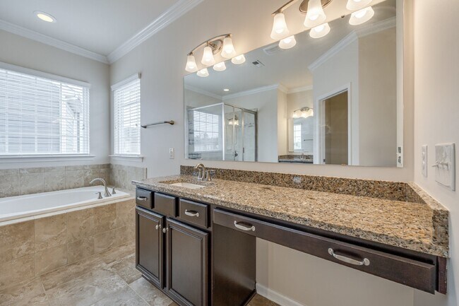 Building Photo - "Spacious 4-Bedroom Retreat with 3 Full Ba...