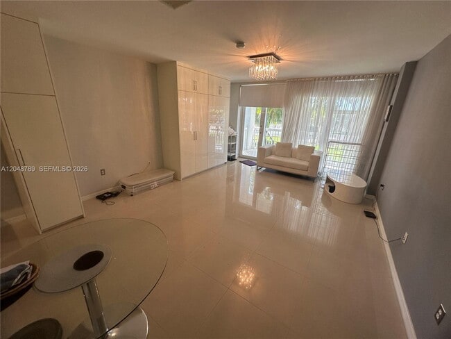 Building Photo - 10275 Collins Ave