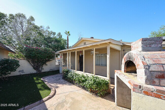 Building Photo - 3408 W Port Au Prince Ln