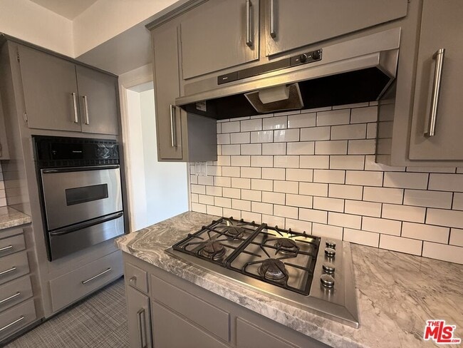 Building Photo - 1366 S Beverly Glen Blvd