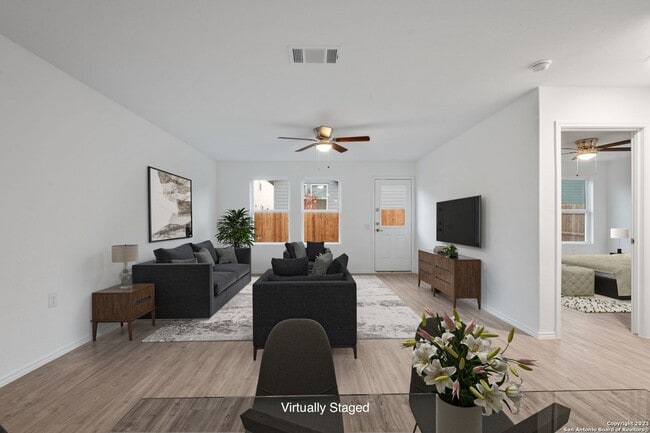 Building Photo - This beautiful single-story home has 4 bedrooms, 2 baths, vinyl flooring throughout, an open floo...