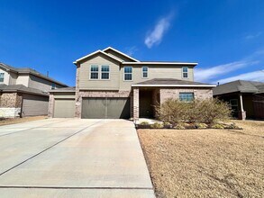 Building Photo - Spacious 4/BR 2.5/BA Two-Level Home with 3-Car Garage & Covered Deck