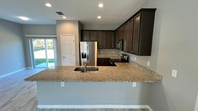 Building Photo - Beautiful 3 Bedroom Palm Bay Home with Upgrades & No Water Bill!