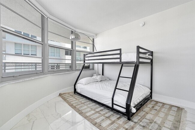 Building Photo - 5555 Collins Ave