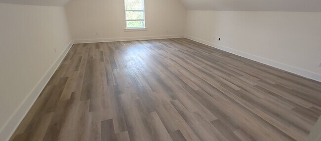 Building Photo - 5-bedroom home with 3 car garage and fully...