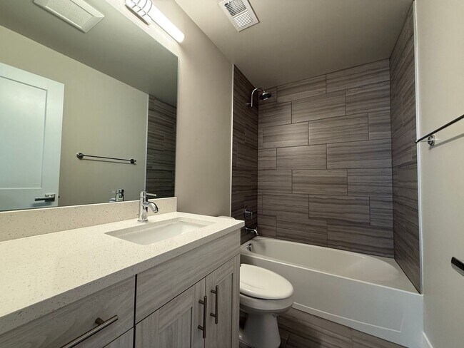 Building Photo - Modern Townhouse with Rooftop Deck & Mountain Views Near Sloan’s Lake!!