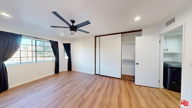 Building Photo - 10220 De Soto Ave