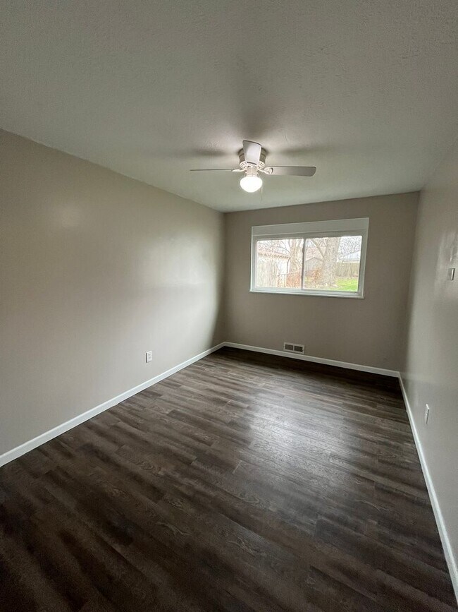 Building Photo - Spacious 3-Bedroom Ranch with 2-Car Garage & Oversized Fenced Backyard