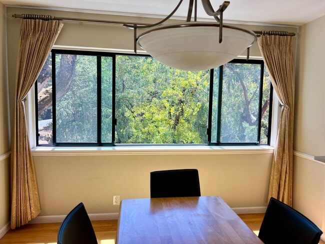 Building Photo - Great Natural light, Treetop Views with 2 Primary Suites plus OFFICE and a 2 car garage, It is li...