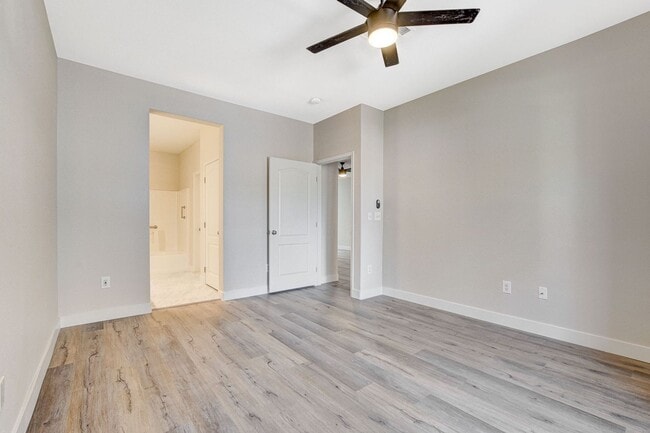 Building Photo - Upgraded First-Floor Condo in a Gated Summ...
