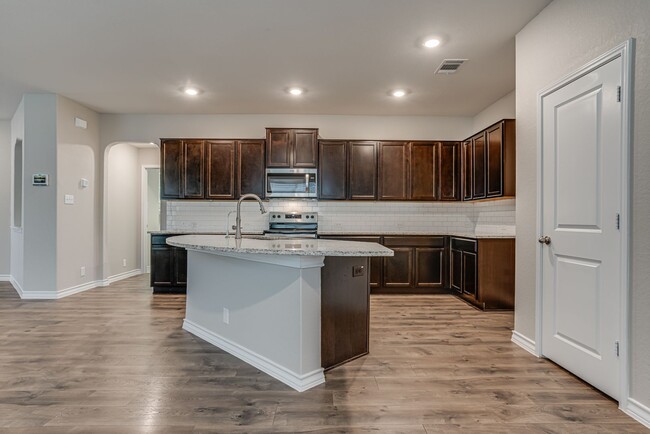 Building Photo - This brand-new, exquisite 3-bedroom, 2-bat...