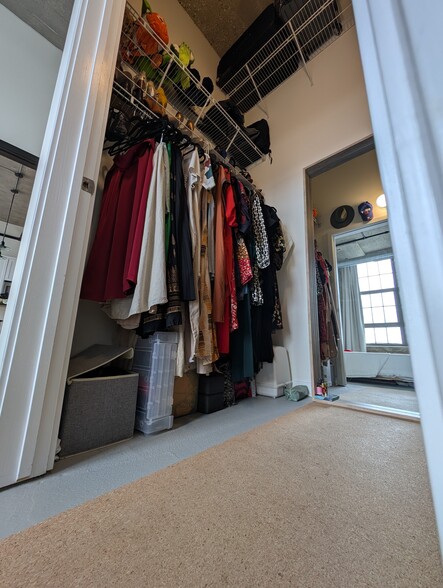 Walk in Closet w storage shelves up to the ceiling - 3963 W Belmont Ave