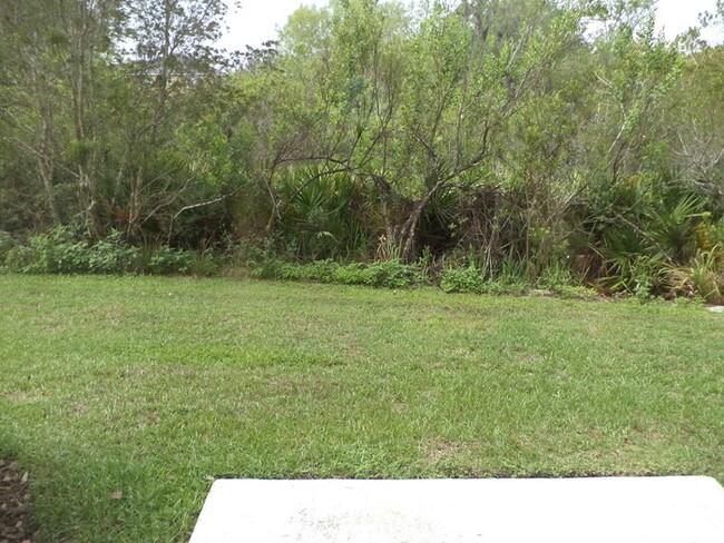 Building Photo - GATED COMMUNITY WITH COMMUNITY POOL