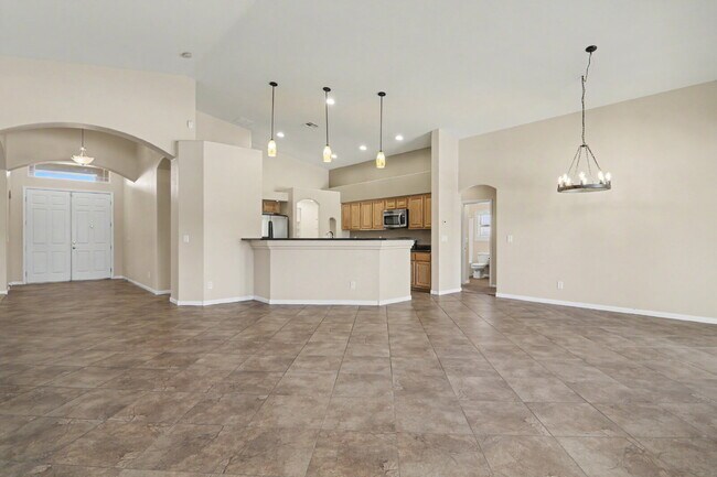 Building Photo - Immaculate 5-Bed, 3-Bath Entertainer’s Home on Over a Quarter Acre in Gated Riverwalk Ranch Manor...