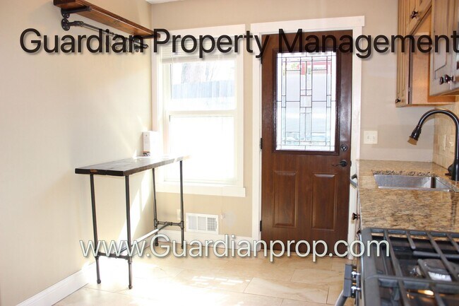 Building Photo - Renovated Side By Side Town Home, 2 Full baths, 2 Full Garage Spaces, Video Walk Through
