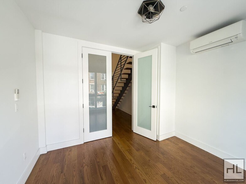 Building Photo - Stunning Two-Bedroom Duplex with Soaring 1...