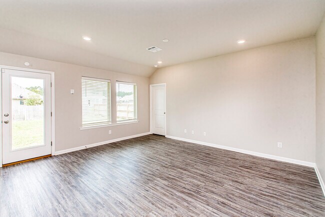 View from the living room to the back door and master bedroom 1 - 48465 Red Fox Dr