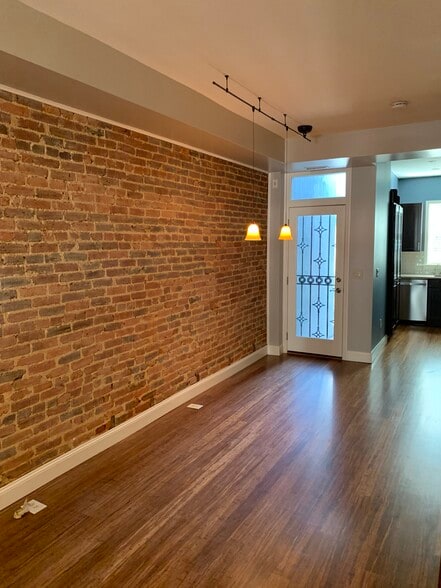 Open-concept living and dining. - 2241 12th Plz NW