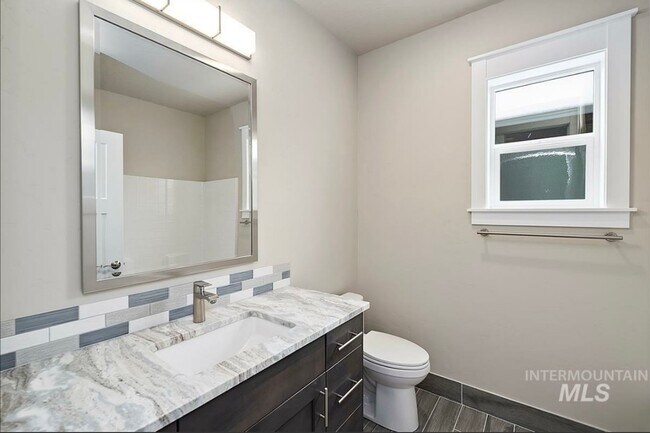 Building Photo - Beautiful Custom Single Level Boise Home A...