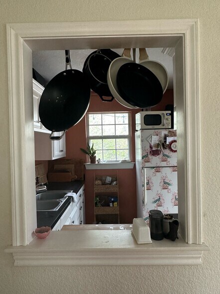 Pass through from the kitchen to the living room 940-383-2500 - 2019 N Bell Ave