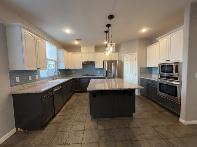 Building Photo - This wonderful 4-bedroom home is located i...